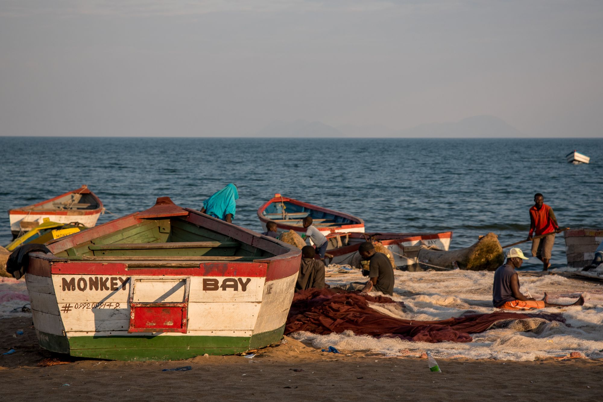 Painted fishing boat on the beach at Monkey Bay